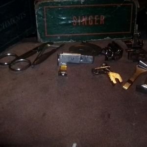 Vintage singer sewing machine attachments